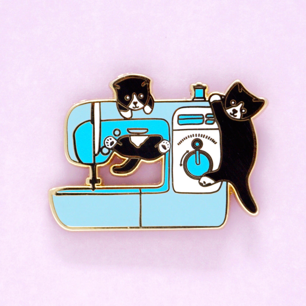 Blue sewing machine kittens enamel pin