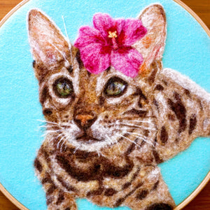 Wool painting of Bengal cat with hibiscus flower