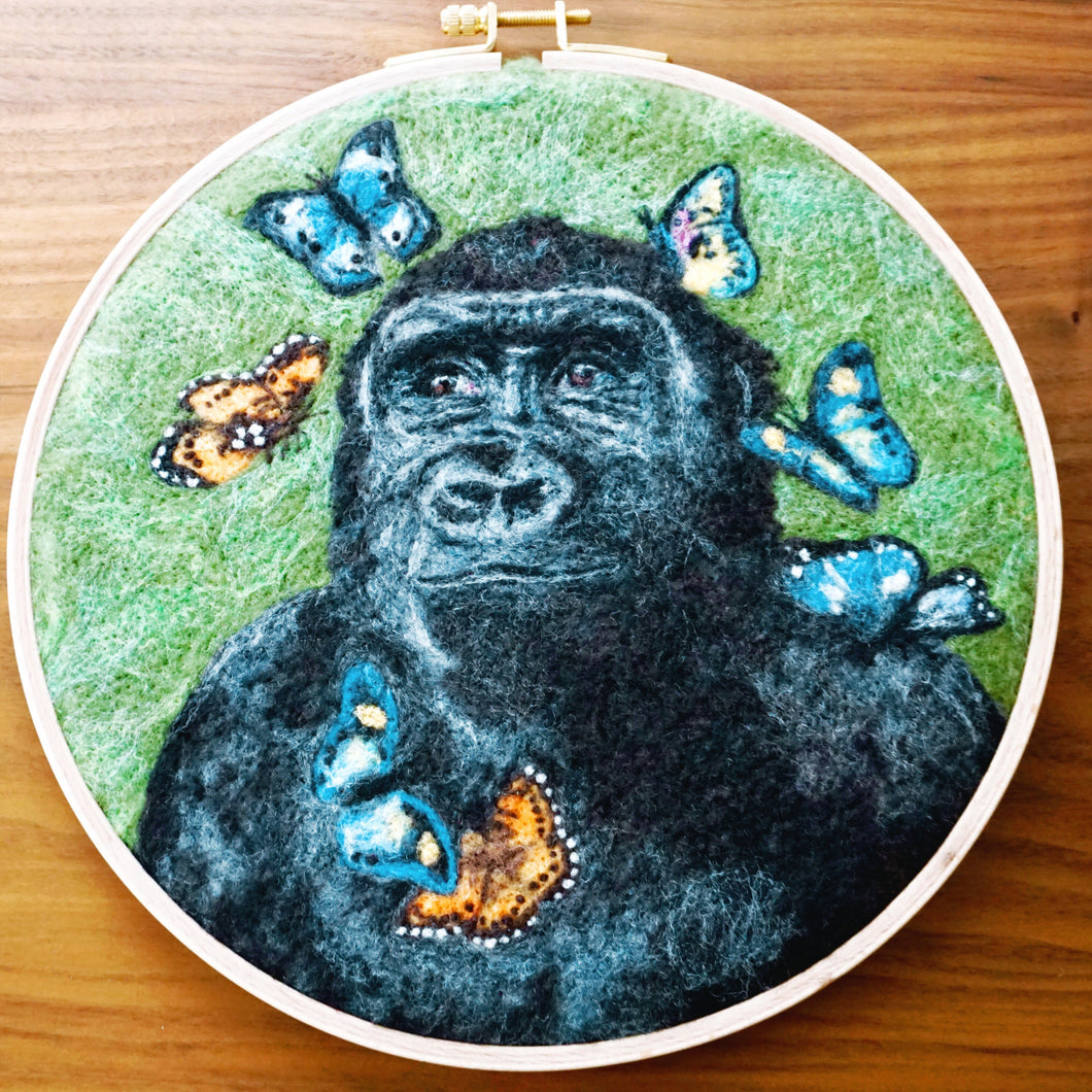 Wool painting of gorilla with butterflies